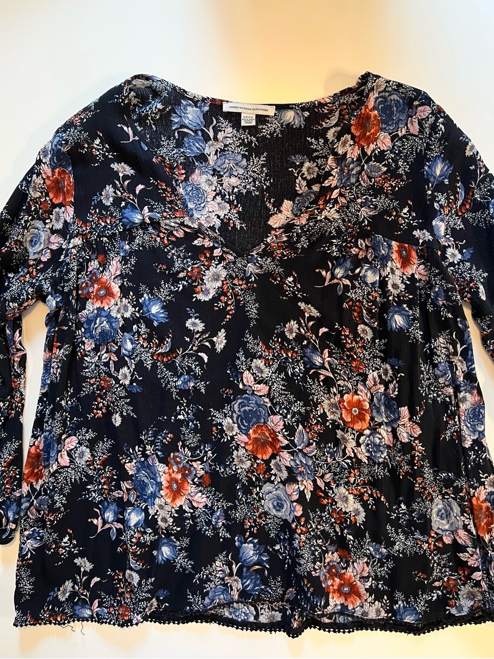 American Eagle Outfitters Navy Floral V-Neck Blouse with Blue and Rust Accents